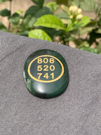 Green jade zibu coin