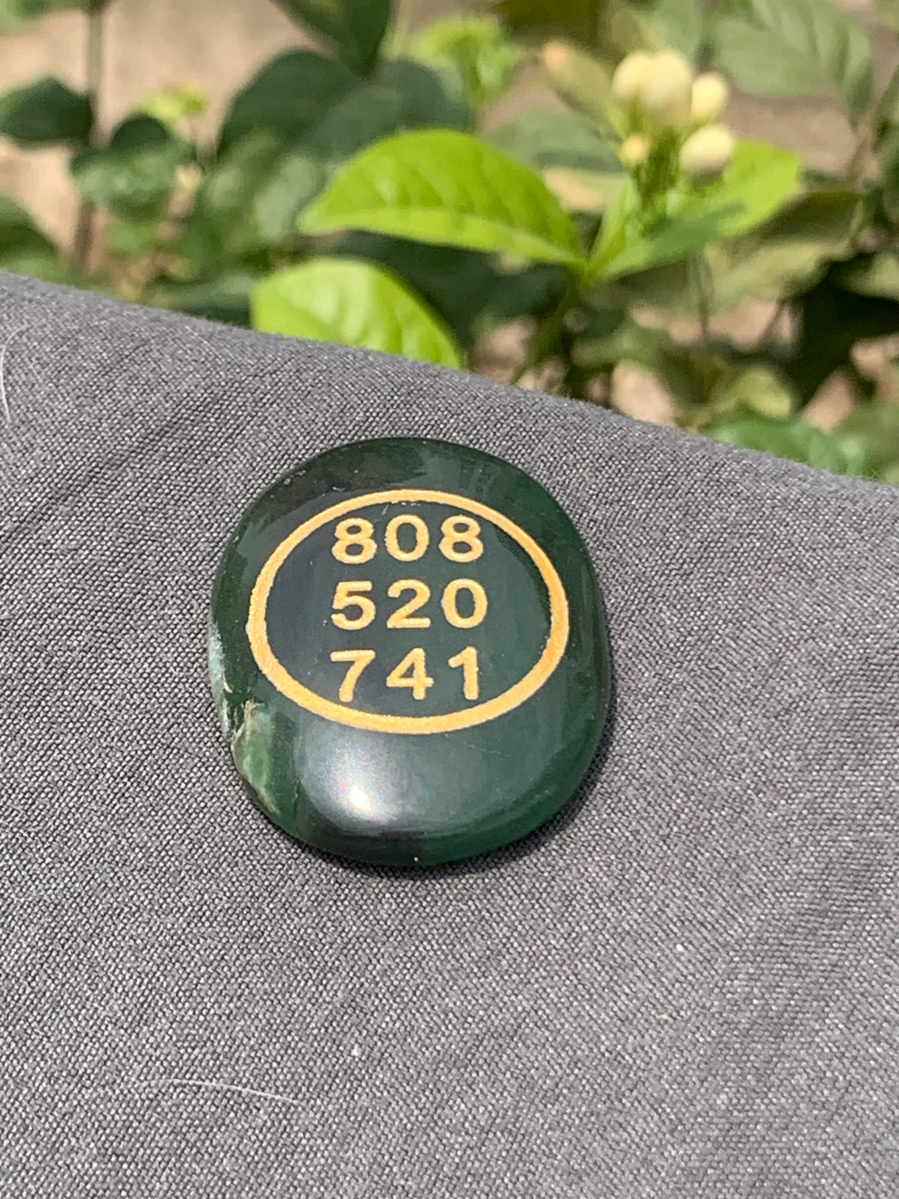 Green jade zibu coin