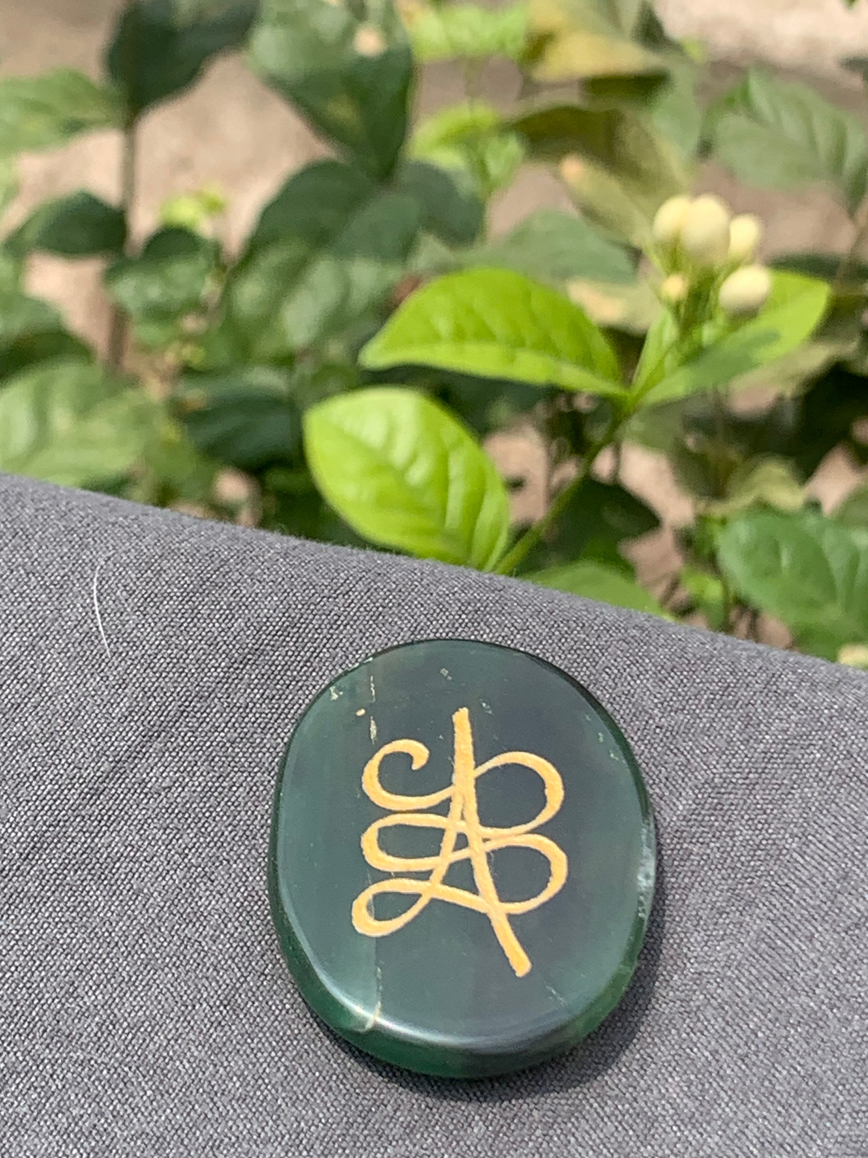 Green jade zibu coin